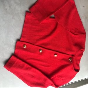 Orange Short crop blazer with gold buttons.